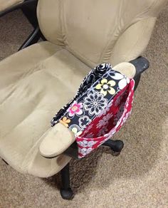 an office chair with a purse on it