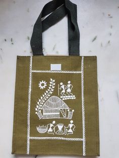 a green bag with white designs on it