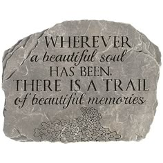 a rock with a quote on it that says, wherever a beautiful soul has been there is a trail of beautiful memories