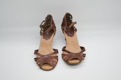 Elevate your style with these Brazilian-Made Red Brown Leather Slingback Peep Toe Sandals. Crafted with precision and style, these sandals boast a strappy design and high cone heel, offering both sophistication and comfort. The peep toe adds a touch of elegance, perfect for warm-weather outings. Made from premium leather, they exude durability and style. These sandals are a versatile addition to your wardrobe, suitable for both casual outings and special occasions. Condition: USED. Some stains, Heel Shoes For Women, Peep Toe Sandals, Slingbacks, Made In Brazil, Brown Sandals, Toe Sandals, Red Brown, Heel Shoes, Shoes For Women