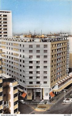 an aerial view of a large white building