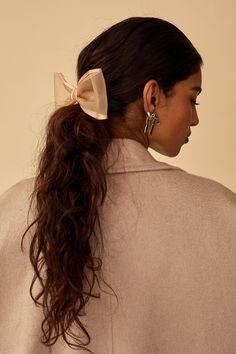 Indulge in the latest trend with the Giselle Mesh Bow Barrette. Made with sheer mesh and delicate silk binding, this this ultra elevated bow is both stylish and comfortable. Wear on the back of the head or on the side, this feminine, yet modern hair accessory is the perfect pairing to your mesh ballerinas. if the material of this bow wrinkles, use a steamer to bring it back to its natural state. Made in NYC. Glam Boho, Black Tie Optional, Mesh Bows, Mini Pony, Halo Headband, Headband Jewelry, Elevated Basics, Cocktail Jewelry, Modern Hairstyles