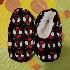 Size 2t-3t Cradle Your Feet In Huggable Comfort With These Spiderman And Friends Slipper Socks. This Stylish Design And Soft Babba Inner Will Keep Your Feet Toasty All Season Long. The Foam Bottom Adds An Extra Bounce To Your Step While Safetydots Non-Slip Grippers Keep You From Sliding! Soft Outer Shell And Sherpa Inner Create Pillow-Soft Comfort. Safety Dots Bottom Grippers Help Prevent Slipping. Easy-To-Care-For Material Is Machine Washable. Cute Black Non-slip Socks, Comfortable Socks For Winter Playtime, Comfortable Winter Socks For Playtime, Comfortable Socks For Playtime In Winter, Comfortable Playtime Winter Socks, Fun Winter Non-slip Socks, Fun Non-slip Winter Socks, Playful Black Non-slip Socks, Playful Black Winter Socks