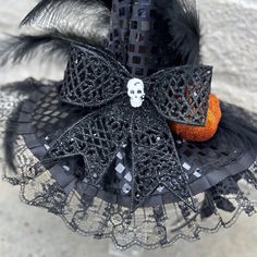 This black Witchy headpiece will take your Halloween outfit to the next level. It is an easy way to add a bit of spooky to you Halloween. *Locally hand made in New Orleans. Headpieces usually ship within 3-5 business days. Please be aware that due to the unique and handmade nature of each product, color, shapes, and sizes may vary slightly from the photo and descriptions. Gothic Black Costume Accessories As Gift, Witchy Black Costume Hats For Cosplay, Punk Mini Hats For Halloween Cosplay, Punk Black Mini Hat For Cosplay, Punk Style Black Mini Hat For Cosplay, Gothic Black Costume Accessories For Halloween, Handmade Costume Accessories For Halloween Masquerade, Black Punk Halloween Costume Accessories, Black Halloween Masquerade Costume Accessories