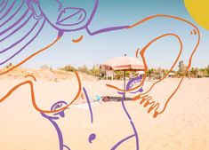 a woman laying on top of a sandy beach under an orange and blue umbrella next to the ocean