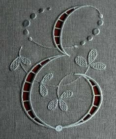 an embroidered design on a piece of cloth