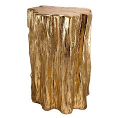 a wooden stump that is gold in color