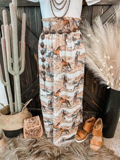 Horse graphic maxi skirt with smock elastic waist. Has a relaxed fit. Woven maxi skirt. Runs true to size with great stretch.  Material: 95% Polyester | 5% Spandex Small (2/4/6) | Medium (6/8/10) | Large (10/12/14) | XL (14/16/18) Nfr Style, Authentic Turquoise Jewelry, Horse Graphic, The Untamed, Top Graphic Tees, Pet Hair, Vintage Shirts, Bottoms Pants, Jumpsuit Dress