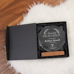 the award is presented in a black box