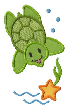 a green turtle swimming in the ocean with a starfish on it's back