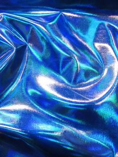 an image of shiny blue material that looks like it is going to be metallic in the future