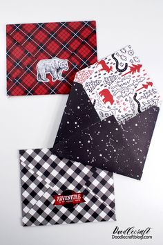 three envelopes with different patterns and designs on them, one has an image of a bear