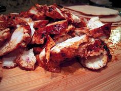 sliced meat on a wooden cutting board ready to be cooked