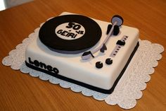 a cake that is shaped like a record player