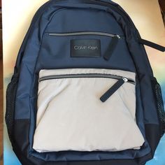 Calvin Klein Blue Backpack W/ Reflective Silver Front Zippered Pouch. 2 Large Zippered Compartments- Can Fit A Laptop 13”. Nwt Calvin Klein Bags, Calvin Klein Bag, Zippered Pouch, Blue Backpack, Klein Blue, Zipper Pouch, Blue And Silver, Front Zipper, Silver Color