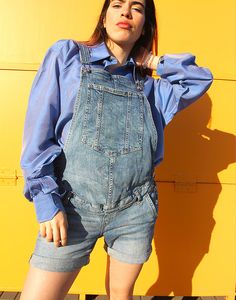 Vintage dungaree shorts in a blue denim. Single chest pocket. Front and back waist pockets. Maternity fit. Size small, UK 8-12 /Eur 36-40. Measurements - 34"(86cm) waist - 38"(97cm) hips - 4"(10cm) inner leg. Material - Denim. Condition - Excellent. Handpicked, repaired and ready to wear. This is an original vintage item, not new and minor signs of wear & age are expected, we will highlight any major flaws. Model is a UK 8 and is 5'6" tall. Spring Shortalls With Pockets, Denim Overalls With Pockets Short Length, Denim Overalls With Pockets In Short Length, Short Denim Overalls With Pockets, Denim Blue Shortalls, Medium Wash Short Length Overalls With Pockets, Short Length Medium Wash Overalls With Pockets, Denim Blue Shortalls With Pockets, Denim Blue Short Length Shortalls