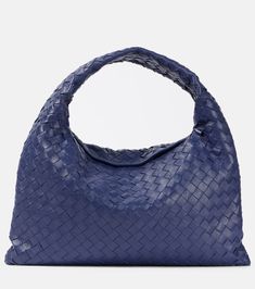 Find BOTTEGA VENETA Hop Small Leather Tote Bag on Editorialist. The Bottega Veneta Hop Small leather tote bag is crafted from calf leather with a calf leather lining. It features a top handle, a magnetic fastening and an internal zipped pocket. The bag is made in Italy. Luxury Blue Top Handle Hobo Bag, Luxury Blue Hobo Bag With Top Handle, Evening Blue Shoulder Bag With Leather Handles, Blue Leather Shoulder Bag With Woven Detail, Designer Blue Woven Leather Shoulder Bag, Designer Blue Shoulder Bag With Woven Leather, Blue Bags With Intrecciato Weave, Blue Shoulder Bag With Intrecciato Weave, Elegant Blue Woven Leather Shoulder Bag