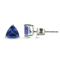 Stunning trillion-cut tanzanite gemstones shine at the center of each of these stud earrings for her. The earrings are fashioned in chic 10K white gold and secure with friction backs.