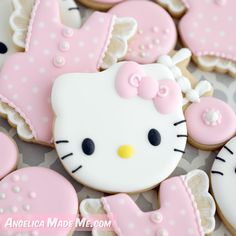 some hello kitty cookies are on a table