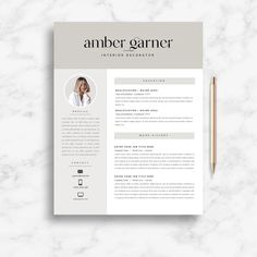 a professional resume template for an interior decorator on a marble background with a pencil