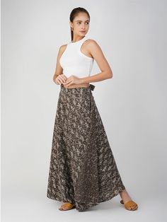 Crafted from breathable cotton fabric, our Luna wrap-around skirt features an A-line fit and flare, allowing you to spend your day care-free and in style. You can tie it around your waist — loose or tight, as per your choice. Its hemline ends just below your ankles and the excellent craftsmanship makes it a perfect choice to rock on casual occasions. Be it day or night, this free-size batik print skirt is incredibly comfortable and can be styled with t-shirts, crop tops, and so much more. Batik It Day, Shirts Crop, Batik Print, Blue Lily, Wrap Around Skirt, Batik Prints, Rock On, Print Skirt, Grey Women