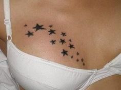 a woman's stomach with stars on it