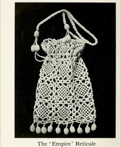 an old crocheted bag with tassels and pompoms on it