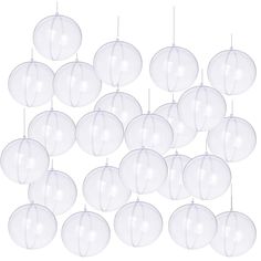 a bunch of white paper lanterns hanging from strings