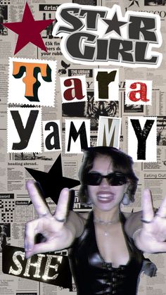 a woman wearing sunglasses making the v sign with her hands and holding up two fingers