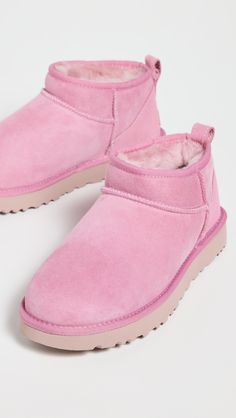 Find UGG Classic Ultra Mini Boots on Editorialist. Cannot be shipped outside the USA Dyed lamb shearling, from Australia. Upper: Sheepskin suede. Lining: Sherpa. Pull tab at heel. Wool lined footbed. No closure, pull-on design. Round toe. Rubber sole. Imported, Vietnam. This item cannot be gift-boxed. Pink Ugg Outfit, Bedazzled Shoes Diy, Ultra Mini Boots, Pink Uggs, Mini Boots, Preppy Shoes