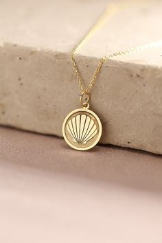 Gold Seashell Pendant - Seashell Gold Necklace ● Material of pendant: Solid Gold 14k ( REAL GOLD ) ● Metal Stamp: 14k ( REAL GOLD ) ● The pendant is available in 5 sizes: - 12,7 mm / 0.5 inches (Diameter) - 14,0 mm / 0,55 inches ( Diameter ) In the photos - 15,3 mm / 0.6 inches ( Diameter ) - 16,5 mm / 0,65 inches ( Diameter ) - 19,1 mm / 0,75 inches ( Diameter ) ( In the photos the size is 14mm / 0.55 inches Diameter ) ( Jump Ring inner diameter: 4 mm ) ● Material of chain: Solid gold 14k ( REA Shell Necklace With Round Pendant As A Gift, Gift Shell Necklace With Round Pendant, Elegant Gold Shell With Lobster Clasp, Sterling Silver Shell As Gift, Dainty Shell Charm Necklace For Gift, Pendant Shell Necklace With Lobster Clasp As Gift, Shell-shaped Charm Necklaces Made Of Shell As Gift, Gift Shell Necklace With Lobster Clasp, Dainty Shell Necklaces Perfect As Gifts