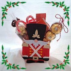 a nutcracker filled with chocolates, candy and candies in a box