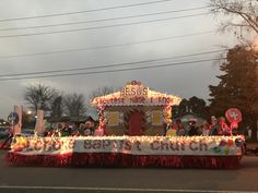 a float is decorated with christmas lights and decorations