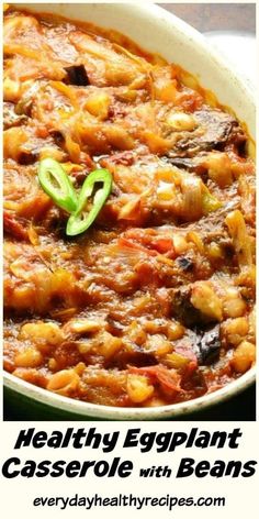 an eggplant casserole with beans in a white bowl