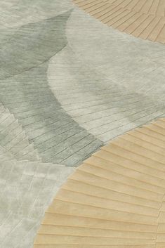 an abstract rug with wavy lines on it