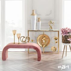 a pink bench sitting next to a table with vases on it