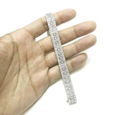 Retro / vintage inspired elegantly slim platinum 950 bracelet. Radiant cut white round natural diamonds 10.63 ct. Diamonds in G-H Color Clarity VS. Length: 18 cm Width: 1.1 cm Weight: 37.6 g [shortcode] [video] [/video] [/shortcode] White Diamond Bracelet In Platinum Luxury Style, White Platinum Diamond Bracelet For Formal Occasions, Formal White Platinum Diamond Bracelet, White Diamond Cut Platinum Diamond Bracelet, White Diamond Cut Platinum Bracelet, White Platinum Diamond Cut Bracelet, White Platinum Diamond Bracelet With Accents, Silver Platinum Diamond Bracelet With Single Cut Diamonds, Wedding Diamond Bracelet With Pave Setting In Platinum