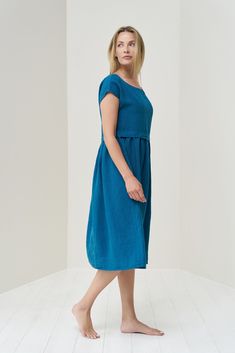 "This linen midi dress is a perfect example of beauty in simplicity. Made from breathable and soft linen, just right below the knee length, This easy-to-wear dress will help you create a relaxed look that you will appreciate throughout the day. ❤️ ❤️ Our products catalog -https://www.etsy.com/listing/1044801005 ❤️❤️ Save your time browsing the shop, take a look at the catalog! ⚠️ ⚠️ **Personalized orders are not returnable** ⚠️ ⚠️ 📌 Check your measurements in the size chart to avoid returns or Blue Linen Knee-length Dress With Relaxed Fit, Blue Knee-length Linen Dress With Relaxed Fit, Relaxed Fit Blue Linen Knee-length Dress, Relaxed Fit Linen A-line Dress, Blue Relaxed Fit Linen Summer Dress, Casual Linen Dresses For Daywear, Blue Linen Midi Dress With Relaxed Fit, Blue Linen Midi Dress Relaxed Fit, Casual Linen Knee-length Dress