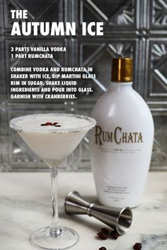 the rumchata cocktail is served in a martini glass and garnished with cranberries