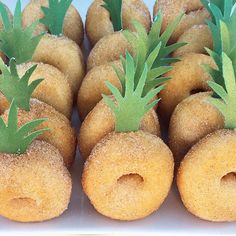 several donuts with pineapples on them are arranged in the shape of doughnut holes