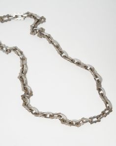 Silver Chain Necklace Elegant Gunmetal Link Jewelry, Formal Silver Necklace With Cable Chain, Formal Silver Jewelry With Chunky Chain, Silver Metal Cable Chain Necklace, Silver Metal Chain Necklace With Rectangular Links, Silver Jewelry With Rectangular Link Chain, Silver Chunky Chain Long Necklace, Silver Link Chain Necklace For Formal Events, Silver Link Chain Necklace For Formal Occasions