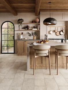 a kitchen with white tile floors and wooden cabinets