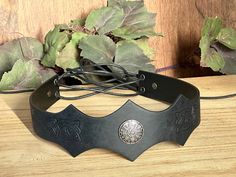 It is a fine leather circlet, with a metal compass mounted on it. The leather band is embossed with classic Celtic knot. And is held in place by lace at the back running through holes with metal. ADJUSTABLE One size fit all. You can make the leather headband adjustments to fit your head size with the lace rope. PERFECT FOR RENAISSSANCE FAIRS for Viking Warrior, suitable for the LARP, Fantasy Events, Comic Con, Halloween Cosplay Parties. This item it will send on First class mail (2 to 5 business Ren Fair Men, Leather Circlet, Viking Headpiece, Warrior Crown, Medieval Headpiece, Leather Headband, Ren Fair, Leather Headbands, Viking Warrior