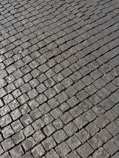 an image of a brick road that looks like it is made out of bricks