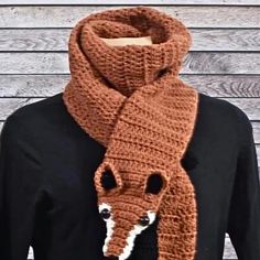 This  crocheted  fox scarf is made by me when you place your order It's also super long, about 60" and will wrap around your neck twice while allowing the head and tail to be in the front.  This scarf has safety eyes for embellishment.  There is a loop on the underside of the scarf to slip the scarf through to keep it secure.  Wash in cold water gently in a lingerie bag and dry flat or tumble dry on low heat. Because the scarf is super long, please allow up to two weeks for your scarf to be made.  Pattern by Beeskneesknitting.etsy.com Fox Scarf, Heads And Tails, Safety Eyes, Favorite Things Gift, Scarf Wrap, Scarf Accessory, Cold Water, Fox, Bathing Beauties