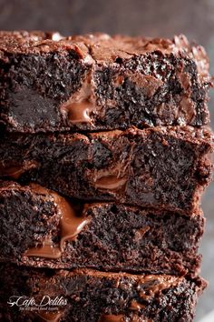 chocolate brownies stacked on top of each other