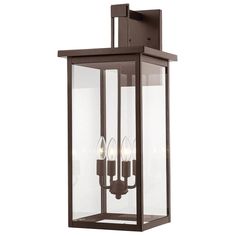 an outdoor light fixture with three lights on the front and back of it, in dark bronze