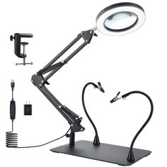 a desk lamp with a magnifying light on it's arm and head