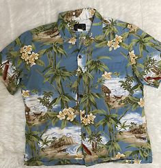 Cotton Camp Shirt With Vintage Print, Hawaiian Shirt With Vintage Print In Cotton, Hawaiian Cotton Shirt With Vintage Print, Hawaiian Cotton Floral Print Shirt, Cotton Hawaiian Shirt With Graphic Print, Cotton Hawaiian Shirt With Floral Print, Blue Hawaiian Short Sleeve Cotton Shirt, Blue Cotton Hawaiian Shirt With Hibiscus Print, Cotton Hawaiian Shirt With Hibiscus Print For Vacation