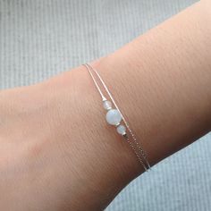 "Minimalist, wearable and delicate 925 sterling silver bracelet of two strands for everyday wearing. Length: from 5,5\" to 8\" with 2\" 925 sterling silver extensor chain. Width: 3 and 6 mm 925 sterling silver beads and moonstone beads. Chain width: 0,66 mm 925 sterling silver chain. Handmade in Spain. Ideal for a gift to silver jewelry lovers. All our products are presented in a white organza bag. ♡ Made with love in Valencia ♡ ----------------------------- Discover the NICTE bracelets collecti Rainbow Crystal Bracelet, Minimal Bracelet, Bracelet Rainbow, Polymer Clay Bracelet, Stack Bracelet, Clay Bracelet, Gold Armband, Beads Chain, Moonstone Beads